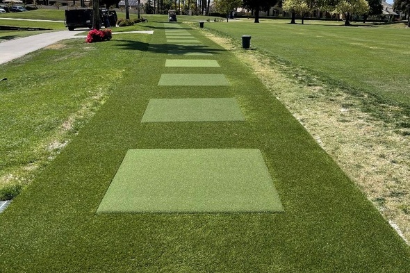 Edmonton Outdoor tee line with light green synthetic grass boxes inside a dark green synthetic grass strip